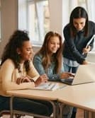 Students and a teacher sharing a meaningful school experience